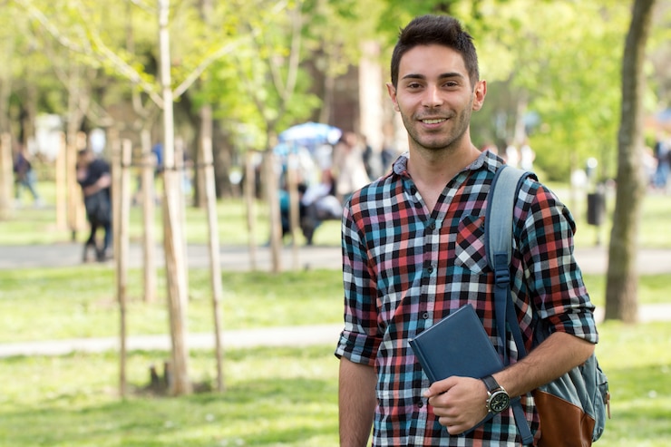 college-student-with-book-outdoor_11055-645